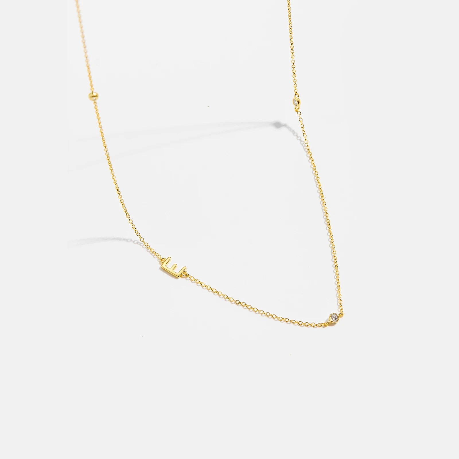 Colar Inicial + Ponto de Luz