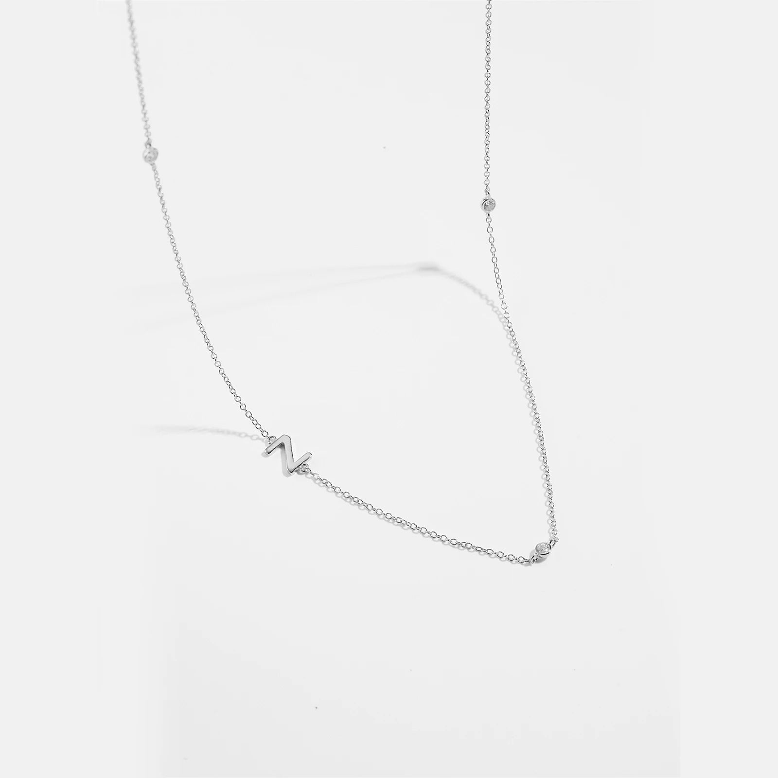 Colar Inicial + Ponto de Luz